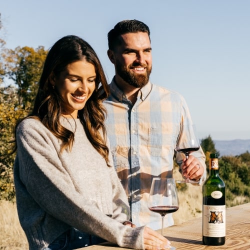 Two people enjoying wine