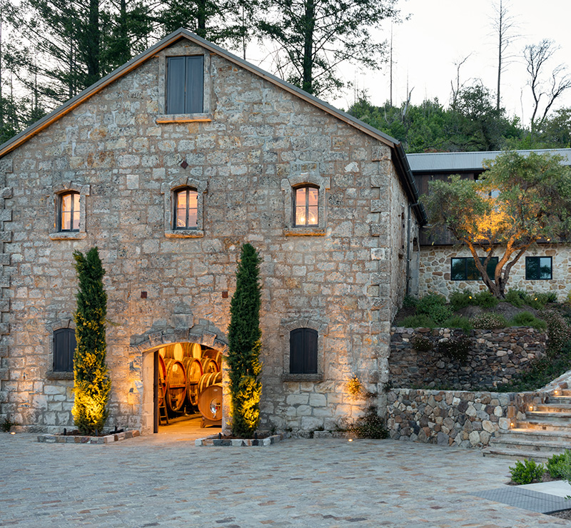 Outside shot of tasting room at Mayacamas estate at dusk