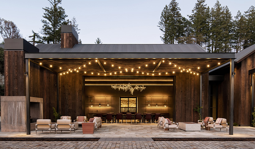 Outdoor tasting area at Mayacamas estate lit with fairy lights